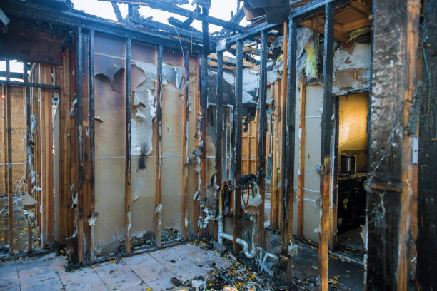 Professional Fire Damage Restoration technician working in Manistee, MI